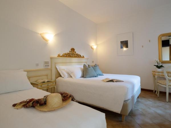 Hotel Guerrini : photo 5 de la chambre chambre triple avec salle de bains privative