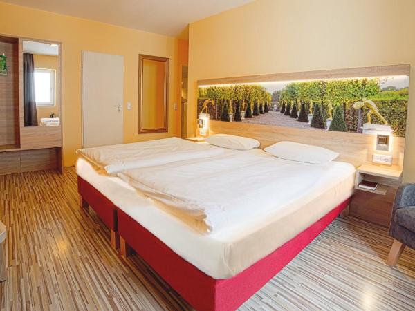 City Hotel Hannover : photo 4 de la chambre chambre double avec salle de bains privative