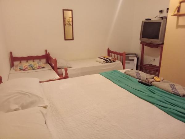 Pousada Caiçaras Búzios : photo 3 de la chambre chambre quadruple