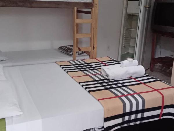 Pousada Caiçaras Búzios : photo 6 de la chambre chambre quadruple