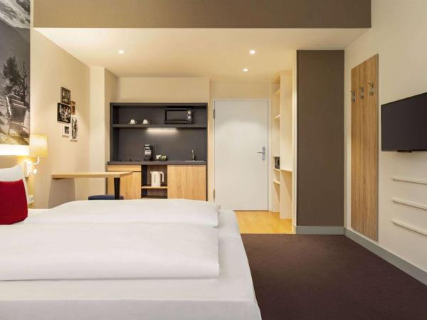 Vienna House Easy by Wyndham München : photo 3 de la chambre appartement
