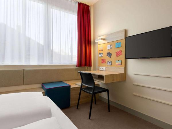 Vienna House Easy by Wyndham München : photo 1 de la chambre chambre confort
