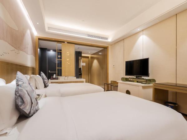 Paco Hotel Shuiyin Road Guangzhou-Free Shuttle Bus For Canton Fair : photo 2 de la chambre chambre lits jumeaux supérieure sans fenêtre