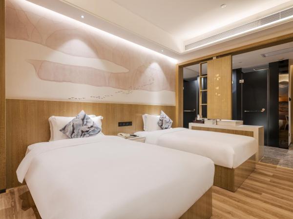 Paco Hotel Shuiyin Road Guangzhou-Free Shuttle Bus For Canton Fair : photo 3 de la chambre chambre lits jumeaux supérieure sans fenêtre