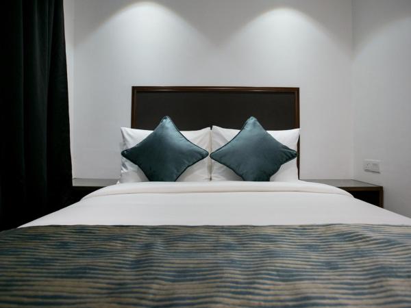 Belllo Hotel JB Central : photo 6 de la chambre chambre premier lit queen-size ou lits jumeaux