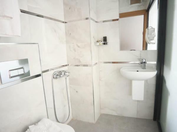 Yuvam akmarmara hotel : photo 7 de la chambre chambre triple basique