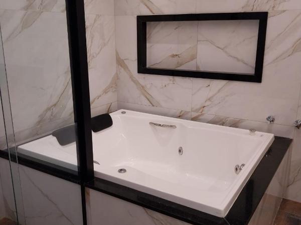 Hotel Pousada Casacolina : photo 7 de la chambre suite deluxe avec baignoire spa
