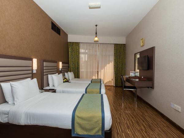 Wave International Hotel : photo 5 de la chambre chambre triple standard