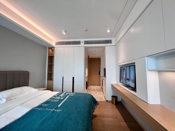 Kaisen Xiyue Hotel Apartment - Shenzhen International Convention and Exhibition Center : photo 1 de la chambre chambre supérieure lit queen-size