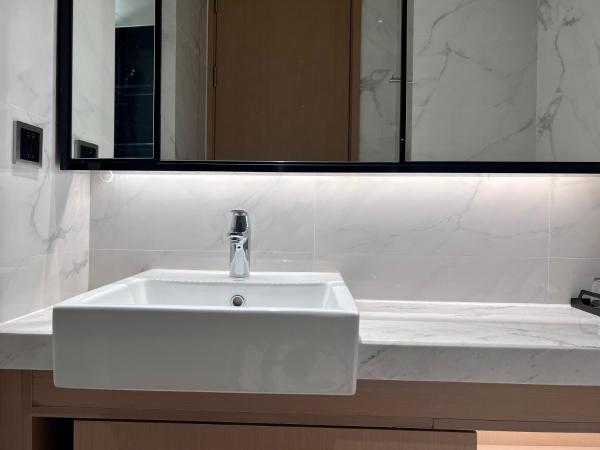 Kaisen Xiyue Hotel Apartment - Shenzhen International Convention and Exhibition Center : photo 9 de la chambre chambre supérieure lit queen-size