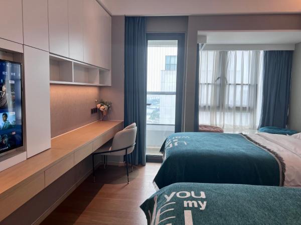 Kaisen Xiyue Hotel Apartment - Shenzhen International Convention and Exhibition Center : photo 3 de la chambre chambre lits jumeaux supérieure