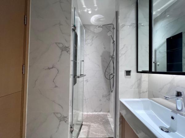 Kaisen Xiyue Hotel Apartment - Shenzhen International Convention and Exhibition Center : photo 4 de la chambre chambre lits jumeaux supérieure