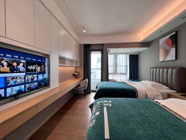 Kaisen Xiyue Hotel Apartment - Shenzhen International Convention and Exhibition Center : photo 7 de la chambre chambre lits jumeaux supérieure