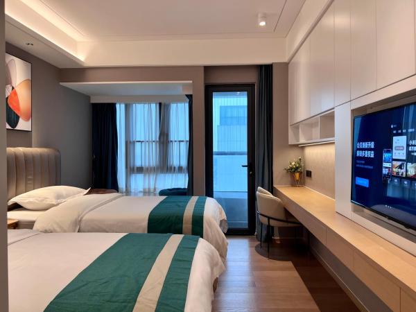 Kaisen Xiyue Hotel Apartment - Shenzhen International Convention and Exhibition Center : photo 3 de la chambre chambre lits jumeaux deluxe