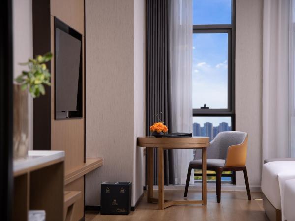 Metropark Hotel Wuhan : photo 5 de la chambre chambre lits jumeaux supérieure