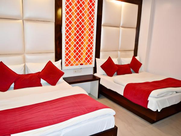 Hotel Sun International : photo 1 de la chambre chambre familiale deluxe