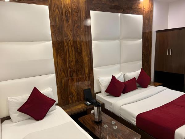 Hotel Sun International : photo 6 de la chambre chambre triple confort