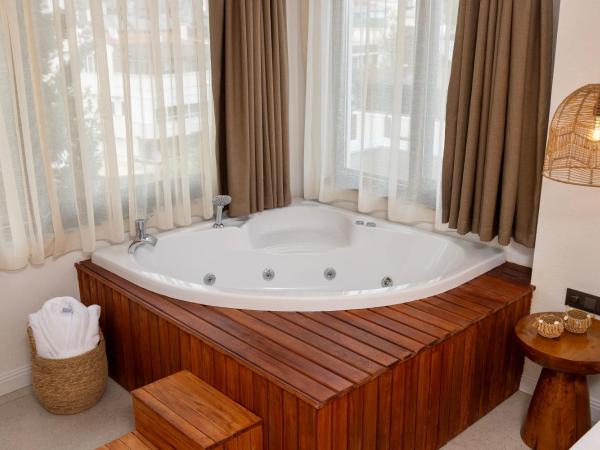 Azuu Boutique Hotel : photo 2 de la chambre suite avec baignoire spa