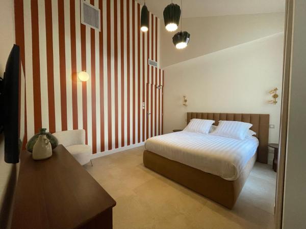 Villa Chiesa : photo 1 de la chambre chambre double deluxe avec baignoire