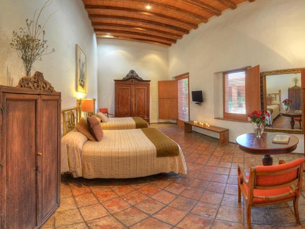 Hotel La Casona de Tita : photo 2 de la chambre chambre deluxe avec 2 lits doubles