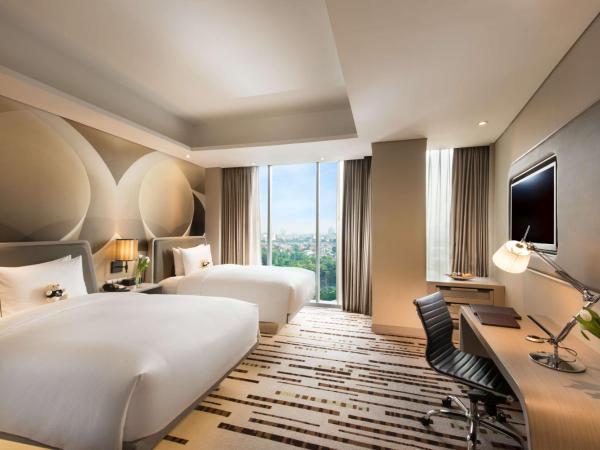 DoubleTree by Hilton Jakarta - Diponegoro : photo 1 de la chambre chambre lits jumeaux
