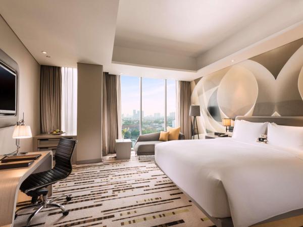 DoubleTree by Hilton Jakarta - Diponegoro : photo 1 de la chambre chambre lit king-size deluxe