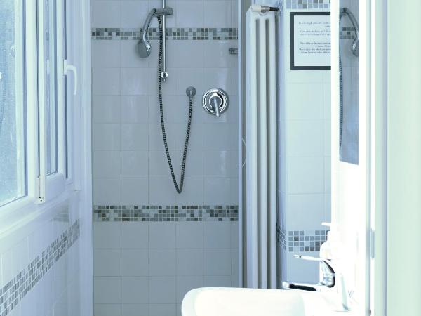 FiorDiLuna, nel cuore di Brescia : photo 1 de la chambre chambre quadruple avec salle de bains privative