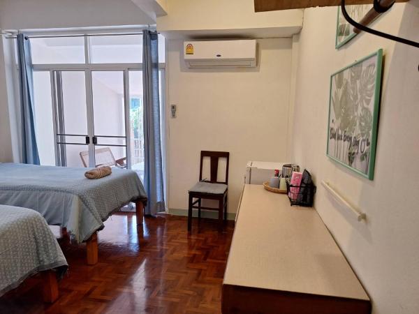 The Commonroom CNX : photo 1 de la chambre chambre lits jumeaux - vue sur jardin