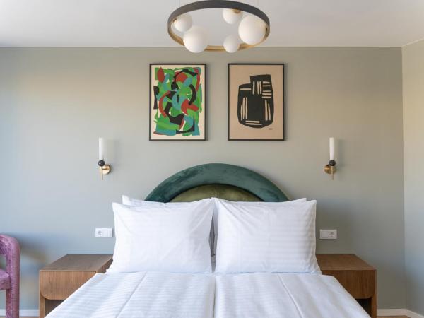 numa I Terra Apartments : photo 2 de la chambre large 1 bedroom apartment with terrace and sofa bed - no ac