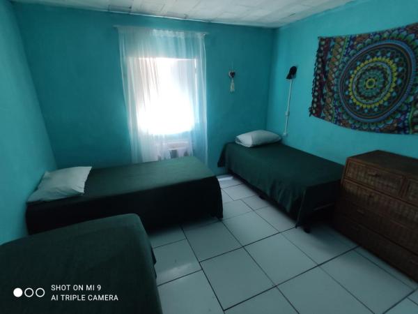 Raizes Surf and Bar Hostel : photo 4 de la chambre lit simple en dortoir