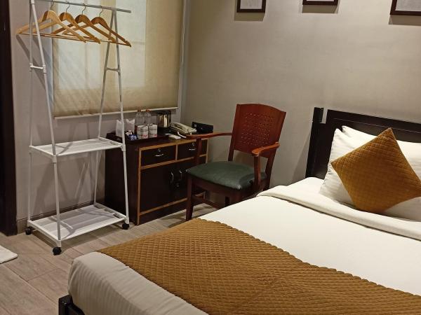 Cosy Grand, Near Chanakyapuri, Embassy Area : photo 1 de la chambre chambre simple deluxe