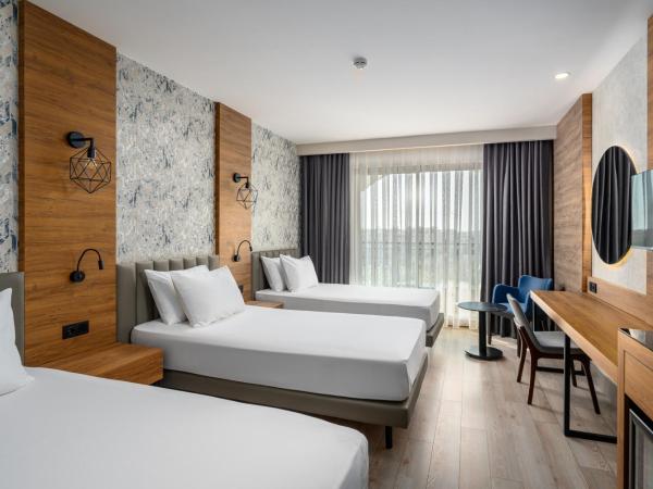 SUN HEAVEN FAMILY & SPA : photo 9 de la chambre chambre triple