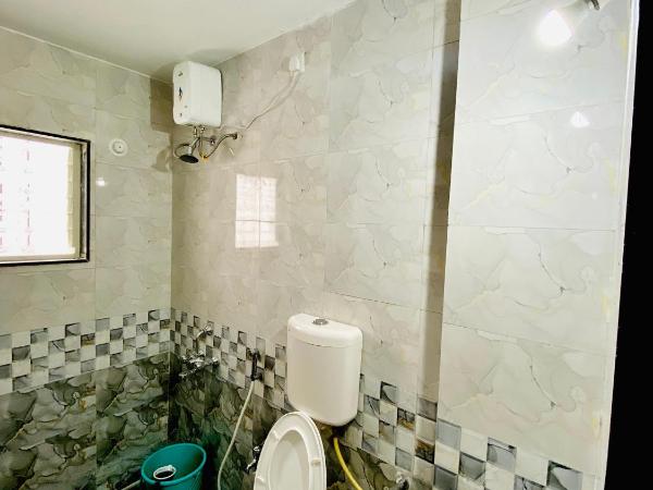 The Peacewood's Homes - Pune's Comfort - Hostel & PG : photo 5 de la chambre dortoir mixte de 4 lits