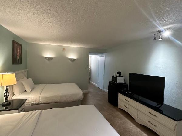 Tahitian Inn Boutique Hotel Tampa : photo 2 de la chambre chambre avec 2 grands lits queen-size