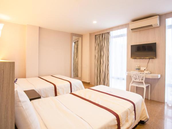 Lavender Inn Nusa Bestari : photo 1 de la chambre chambre familiale deluxe