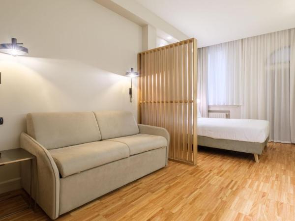 Hotel Touring : photo 2 de la chambre suite junior