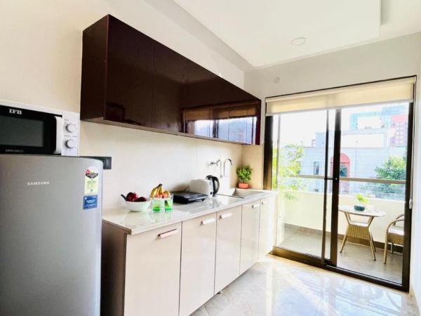 BluO Studio4 DLF Cybercity - Balcony, Gym TT, Lift : photo 1 de la chambre studio lit king-size