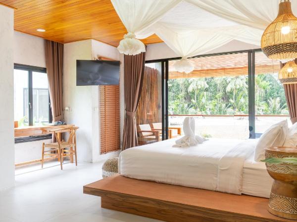 Long Beach Chalet - SHA Extra Plus : photo 8 de la chambre chambre pavillon lagon avec baignoire spa