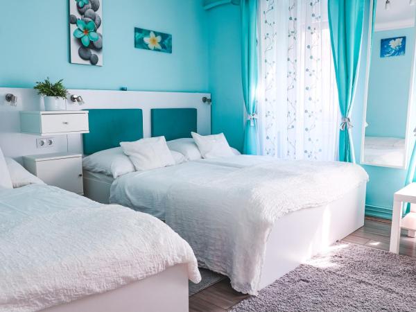 Szivárvány Panzió : photo 6 de la chambre chambre triple