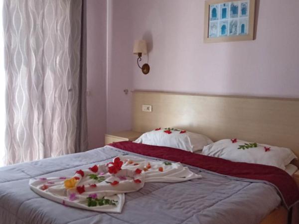 Hôtel Romane : photo 3 de la chambre chambre quadruple