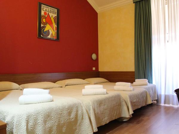 Club Hotel : photo 1 de la chambre chambre quadruple