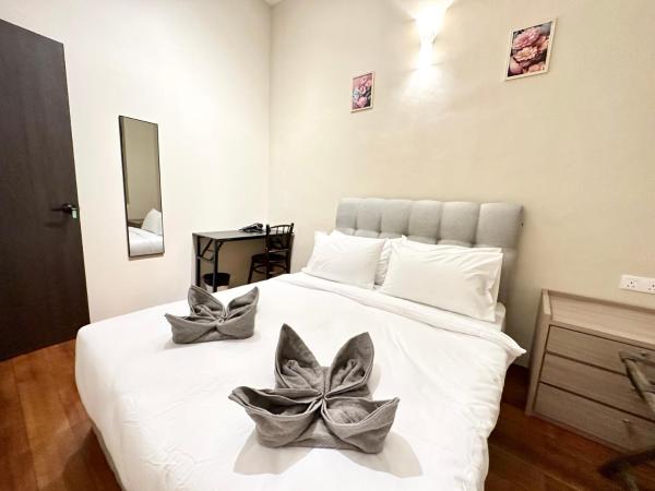 Madras Inn 58-1 : photo 10 de la chambre chambre double standard avec salle de bains commune