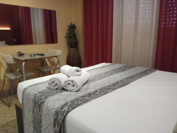 Hostal Happystay : photo 5 de la chambre chambre lit queen-size deluxe