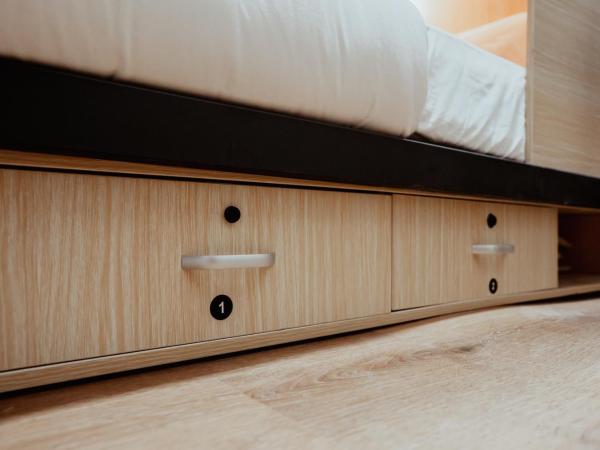 Code Hostel Singapore : photo 6 de la chambre capsule lit simple dans dortoir pour femmes