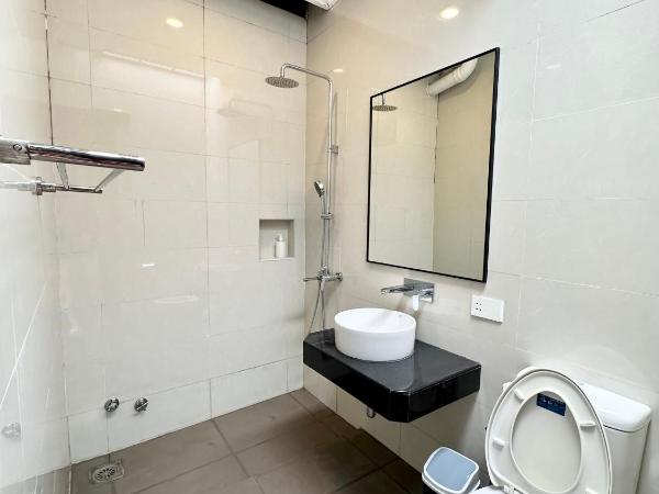 Madras Inn 58-1 : photo 10 de la chambre chambre double standard avec salle de bains commune