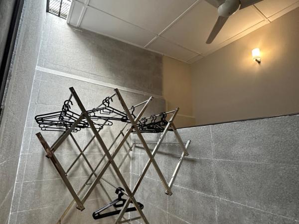 Madras Inn 58-1 : photo 8 de la chambre chambre double standard avec salle de bains commune