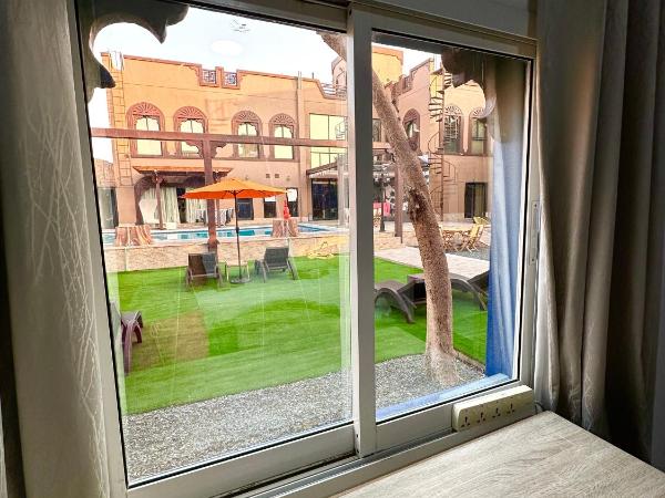 DARÏ : photo 1 de la chambre chambre double - vue sur piscine