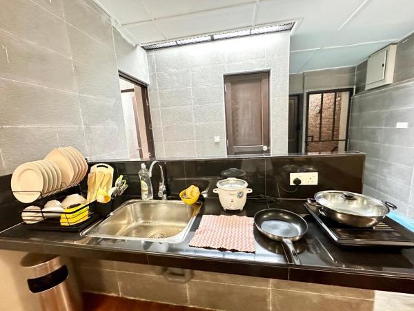 Madras Inn 58-1 : photo 5 de la chambre chambre double standard avec salle de bains commune