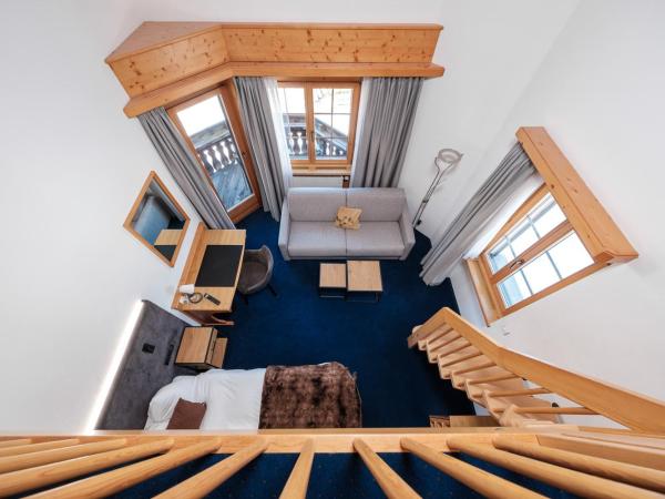 Hotel Bünda Davos : photo 4 de la chambre chambre familiale avec balcon