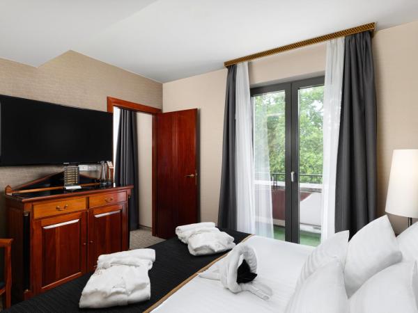 Hotel Divinus : photo 1 de la chambre chambre double deluxe avec balcon